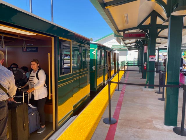 Visitors inside the Maui airport trolley