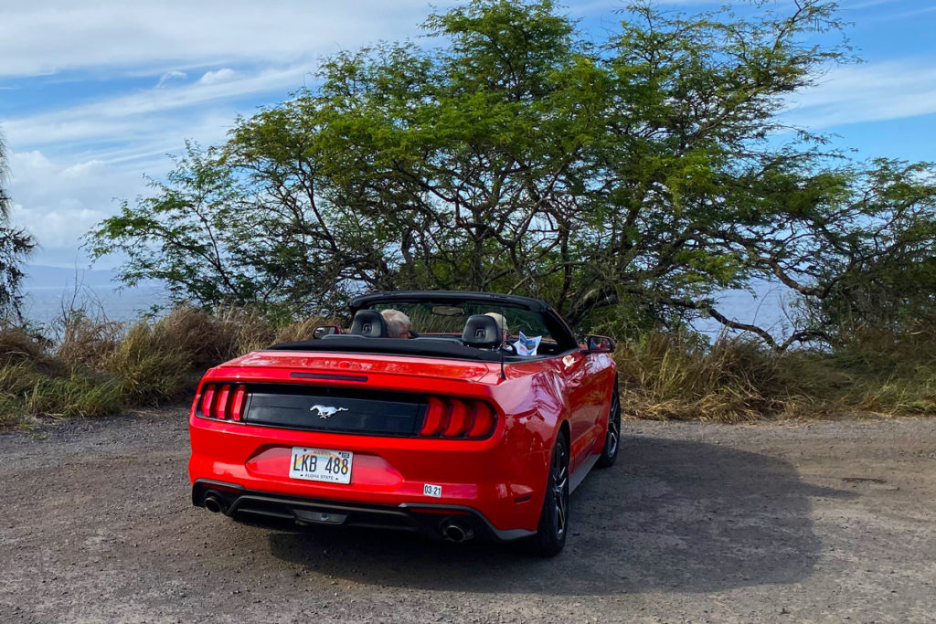 Convertible car rental parked on Maui Island