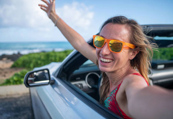 Happy convertible rental customer on Maui
